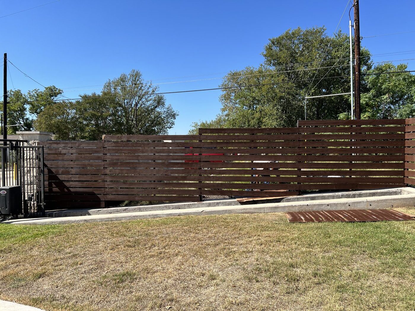 Fence hail damage — after repair