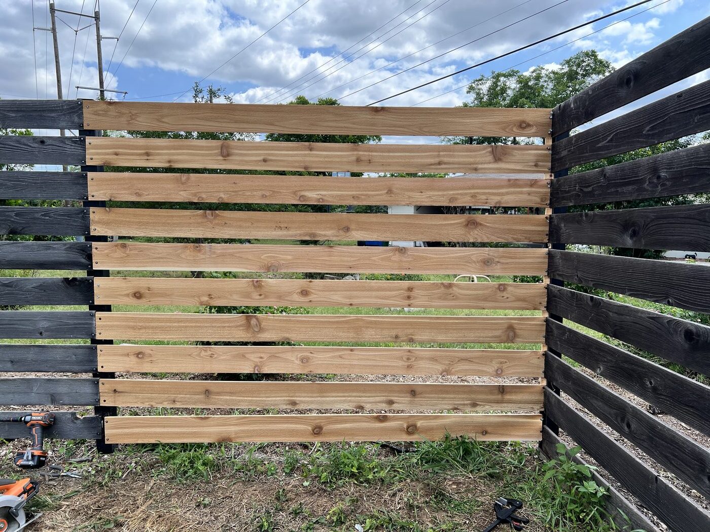 Fence storm damage — after repair