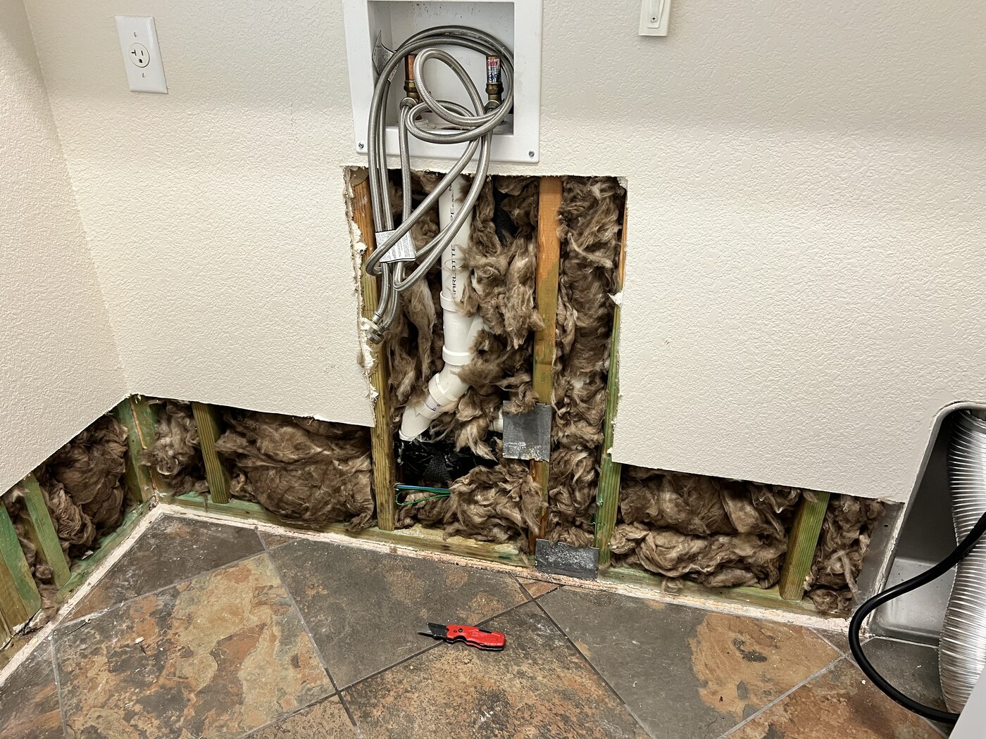 Concrete/drywall repair — before