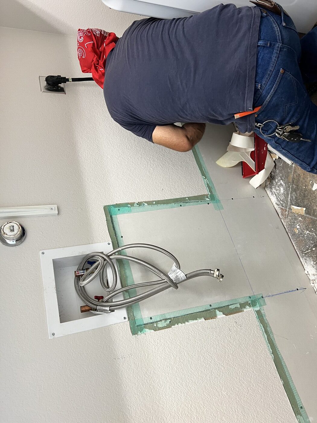 Concrete/drywall repair — during