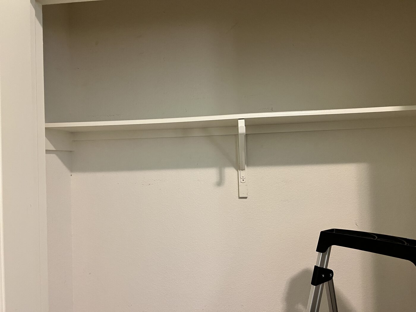 Closet shelf — before